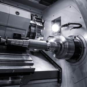 industrial metal work bore machining process by cutting tool on the automated lathe